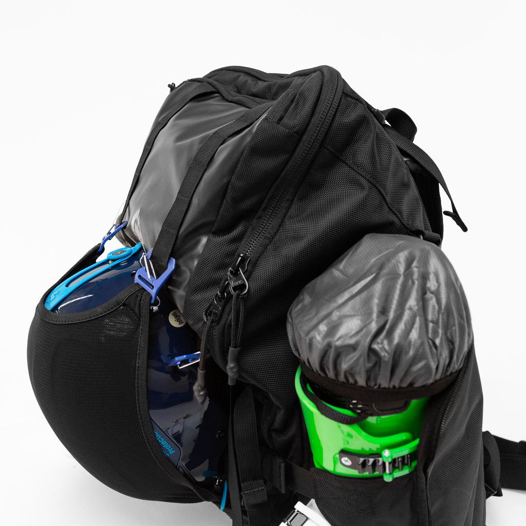 sync-performance-athlete-ski-race-backpack-helmet-boots-side